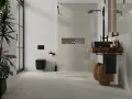 Nowoczesna łazienka z czarną armaturą i roślinnością. Eleganckie układanie płytek 120x60 na ścianie tworzy spójną całość.