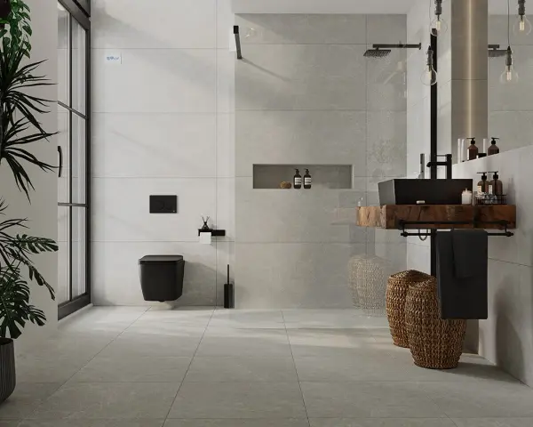 Nowoczesna łazienka z czarną armaturą i roślinnością. Eleganckie układanie płytek 120x60 na ścianie tworzy spójną całość.